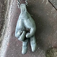 TWO pendant by Ant Hat. Handcrafted in oxidised sterling silver, depicting a raised two-finger salute for a cheeky, rebellious statement.
