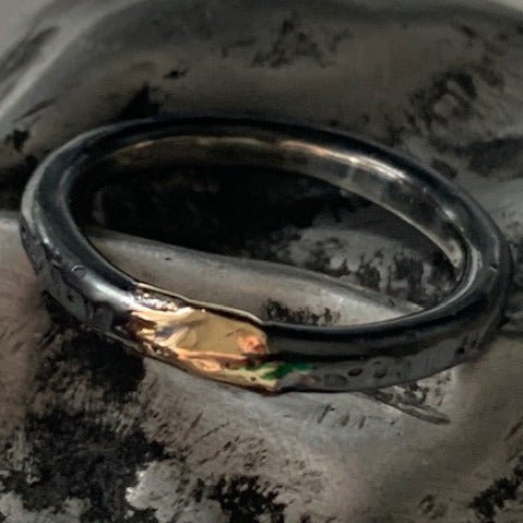 Urban Edge ring by Gavin Macsporran. Handcrafted in oxidised sterling silver with a bold gold highlight, combining modern edge with luxurious contrast.