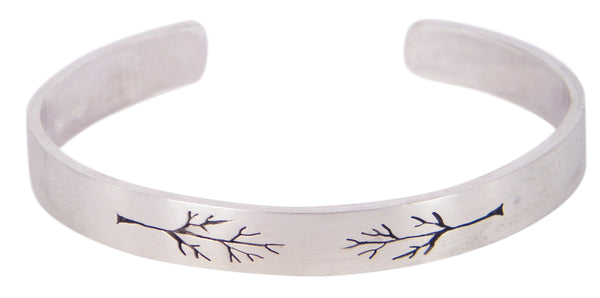 Pierced Tree by Melissa Baldock. A handcrafted cuff with intricate details, perfect for those who value Australian craftsmanship.