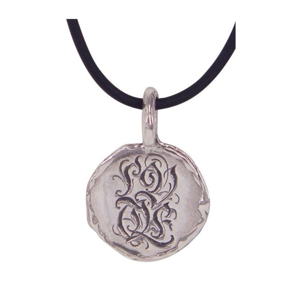 Love (wonky disc) pendant by Ali Alexander. A striking pendant with exceptional craftsmanship, highlighting Australian handmade jewellery.
