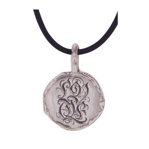 Love (wonky disc) pendant by Ali Alexander. A striking pendant with exceptional craftsmanship, highlighting Australian handmade jewellery.
