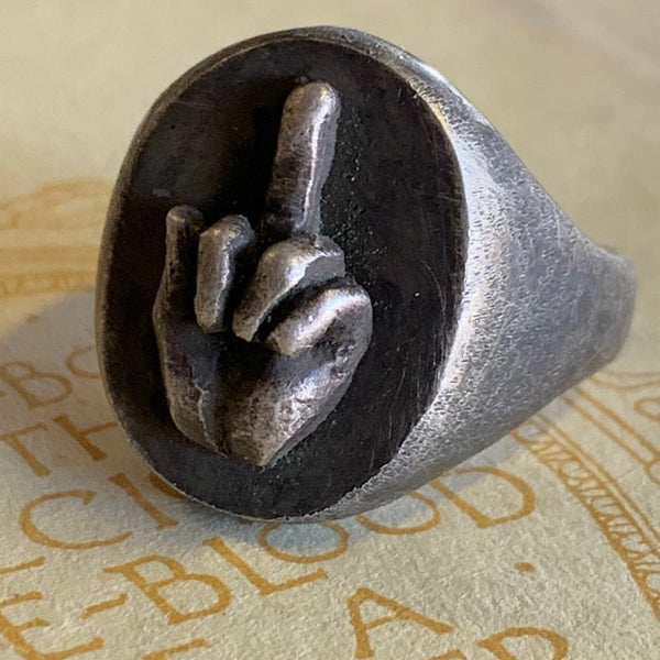 FU signet ring by Aimee Sutanto. Handcrafted in oxidised sterling silver, featuring bold “FU” engraving for a rebellious, unapologetic statement.