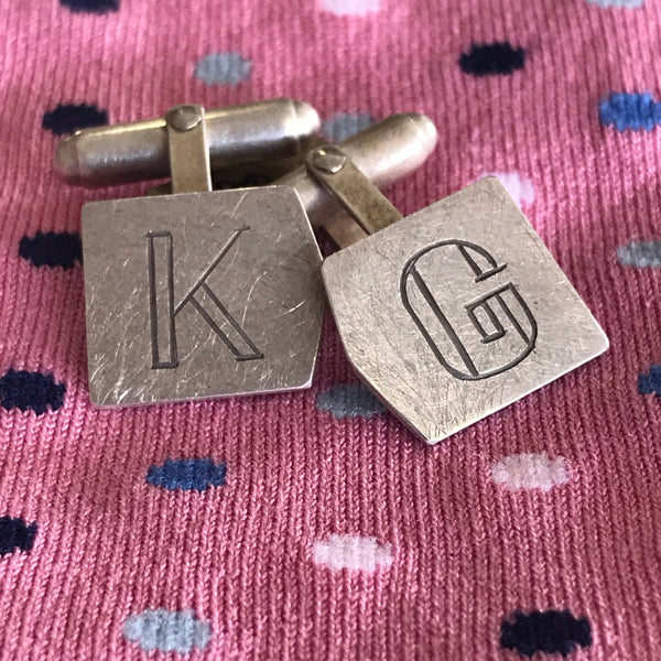 Neo Deco cufflinks by Aimee Sutanto. Handcrafted in sterling silver with bold Art Deco lines—customisable initials add a personal touch.