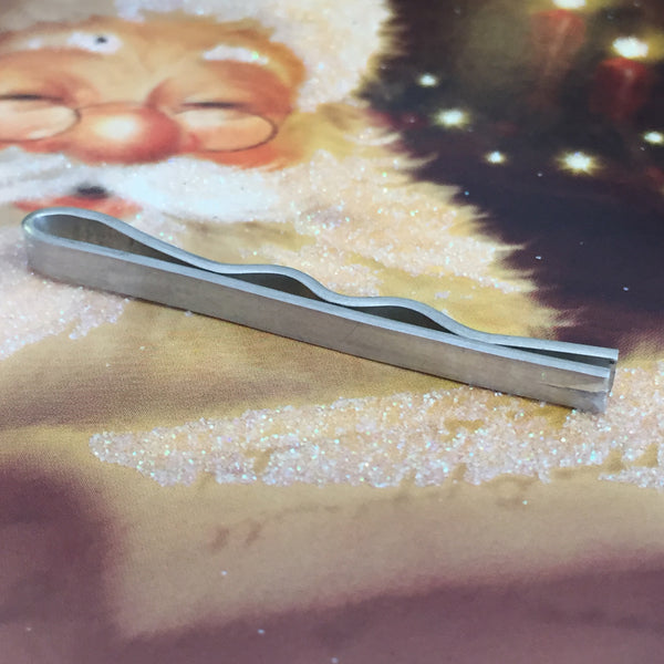 Wedge tie bar by Aimee Sutanto. Handcrafted in sterling silver with a bold wedge shape, offering a modern, minimalist accent for sharp styling.