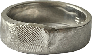 Fingerprint ring (7mm) handcrafted in sterling silver, featuring a personalised fingerprint design for a unique, customisable and one-of-a-kind piece.