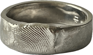 7mm fingerprint ring handcrafted in sterling silver, showcasing a personalised fingerprint pattern, creating a unique and meaningful design.