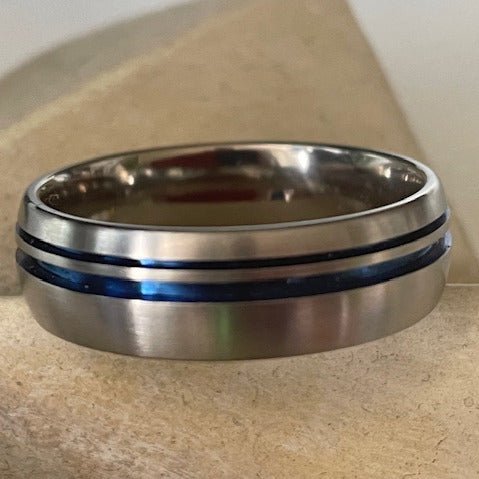 GTS Thin Ellipse wedding ring by David Parker. Handcrafted in titanium with a sleek elliptical design, offering modern elegance and lasting durability.