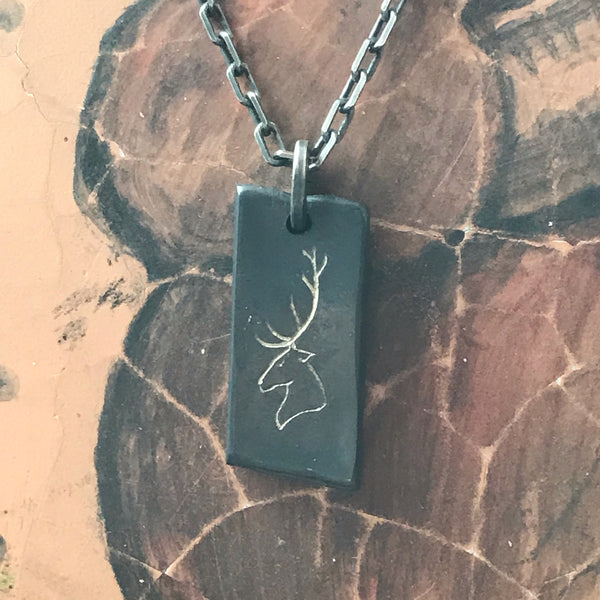 Stag pendant by David Parker. Handcrafted in oxidised sterling silver, featuring a detailed stag design—bold, intricate, and uniquely Australian.