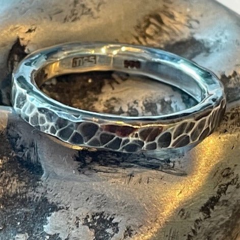 3mm Getting Hammered ring by Gavin Macsporran. Handcrafted in oxidised sterling silver, featuring a hammered texture for a rugged, industrial look.