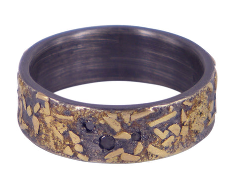 Handmade men's wedding ring by Jeanette Dyke in oxidised silver and gold, featuring a bold boulder design with 3 black diamonds. Unique Melbourne-made Australian craftsmanship.