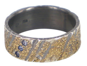 Handmade men's wedding ring by Jeanette Dyke in oxidised silver and gold, featuring 3 blue sapphires. Unique Melbourne-made Australian craftsmanship.