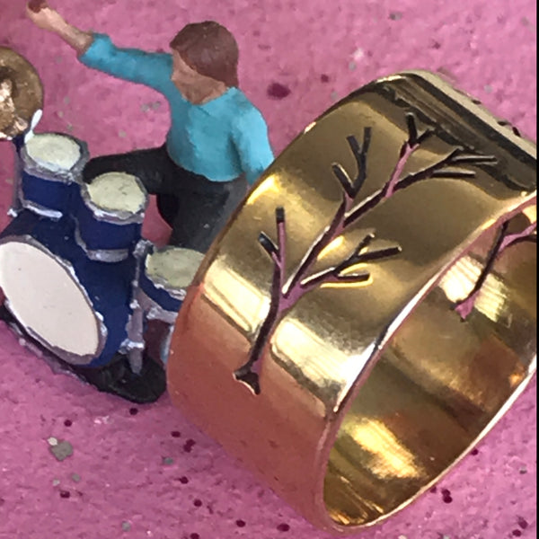 Pierced Tree Parallel wedding ring by Melissa Baldock. Handcrafted in 9ct gold, featuring an intricate tree design with parallel lines for a nature-inspired look.