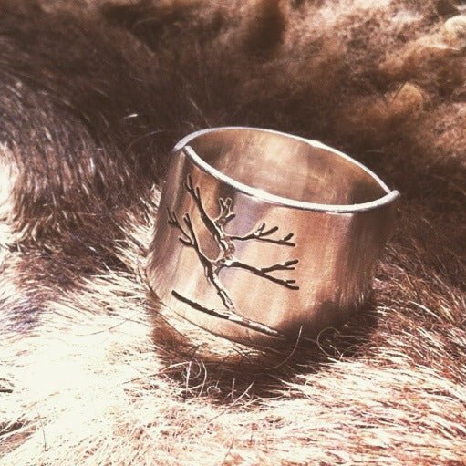 Pierced Tree abstract signet ring by Melissa Baldock. Handcrafted in sterling silver, featuring an abstract tree design with delicate cut-out details for a unique look.