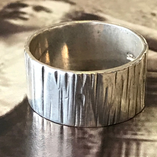 Wide Bark men's ring by Melissa Baldock. Handcrafted in sterling silver, featuring a textured bark-inspired design for a bold, nature-inspired look.