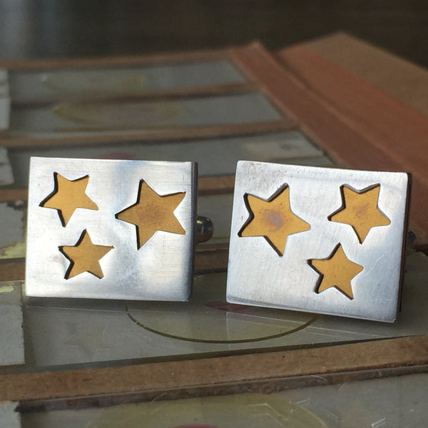 Stars cufflinks by Philip Monk. Handcrafted in sterling silver, featuring detailed star designs for a celestial-inspired, modern accessory.