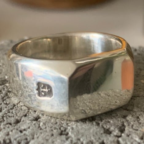 Anchor signet ring by Sebastian Cilento. Handcrafted in sterling silver, featuring a bold anchor motif symbolizing strength and stability.