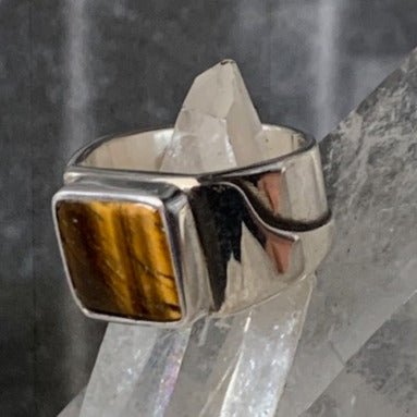 Fokker ring by Sebastian Cilento. Handcrafted in sterling silver with tiger’s eye, showcasing bold lines and rich Australian-made detail.