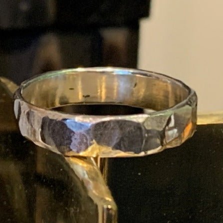 Chips ring by Unnon. Handcrafted in sterling silver, featuring textured chip details for a modern, unique design with a bold, industrial aesthetic.