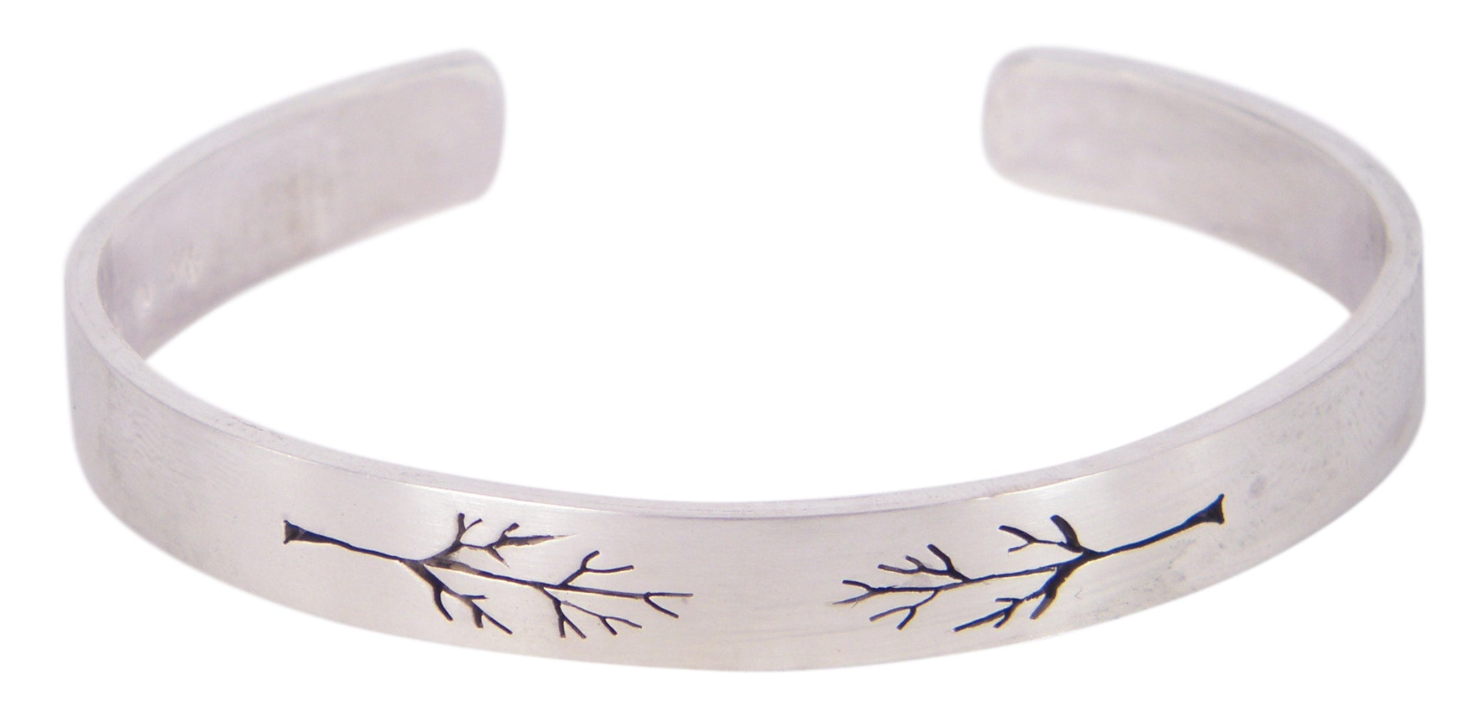 Pierced Tree by Melissa Baldock. A handcrafted cuff with intricate details, perfect for those who value Australian craftsmanship.
